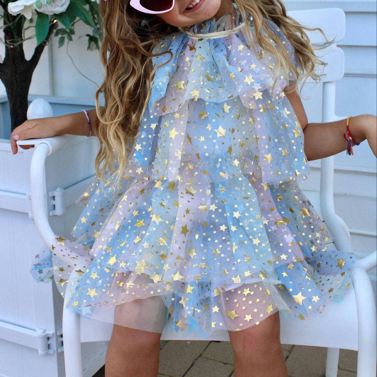 Girls' shimmering multi layer star ruffled tulle dress